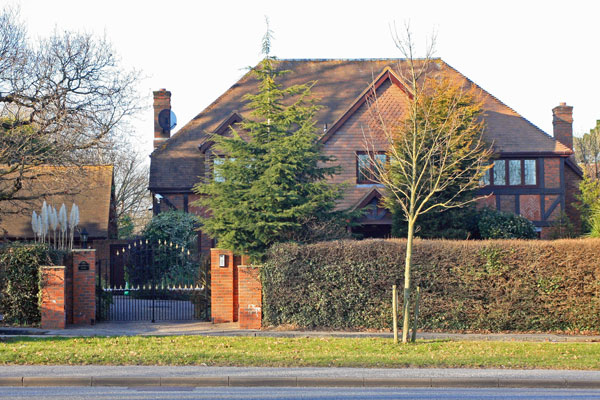 Gated and secure, five bedroom house in tudor style